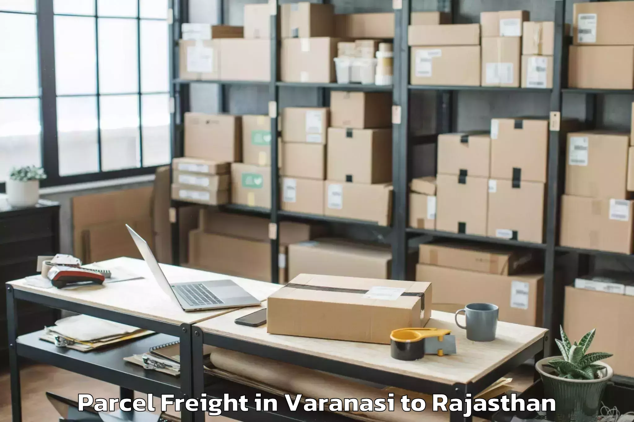 Get Varanasi to Pachpadra Parcel Freight